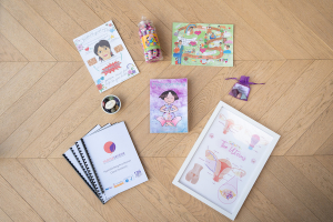 A flat-lay of what is included in the MamaSerene Hypnobirthing Practitioner Training pack